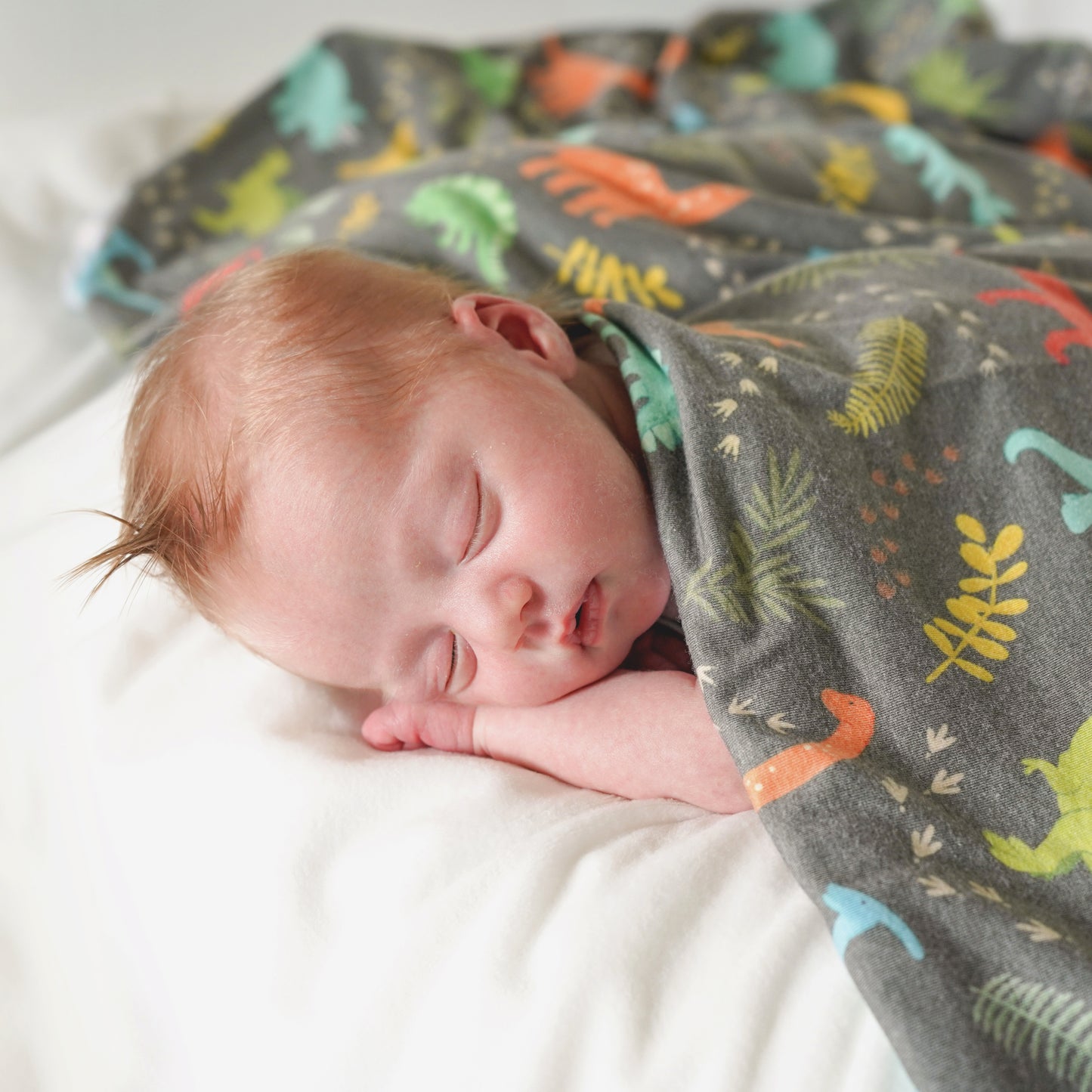 Extra Soft Stretchy Knit Swaddle Blanket: Jurassic Tracks