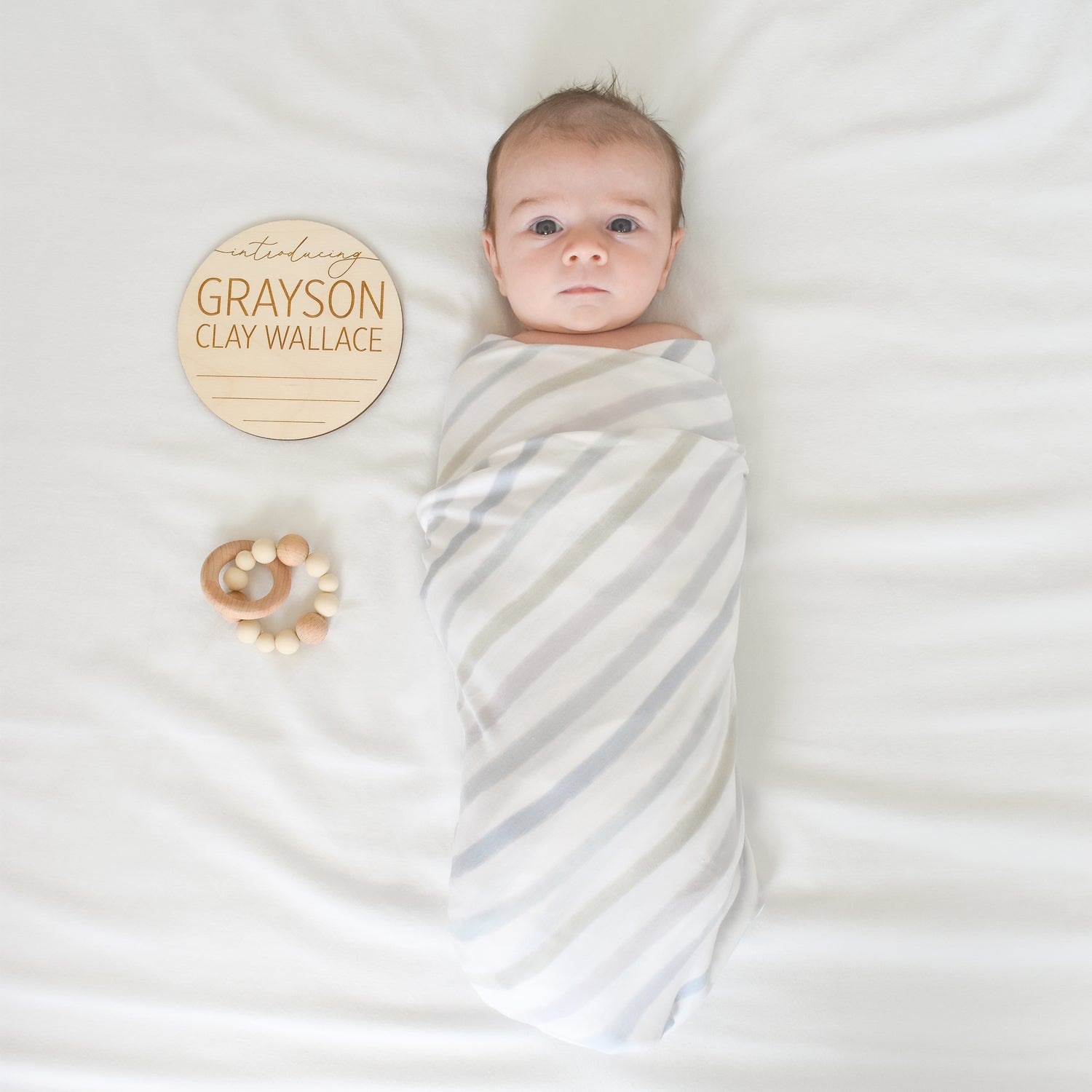newborn photo with name weight date and length sign