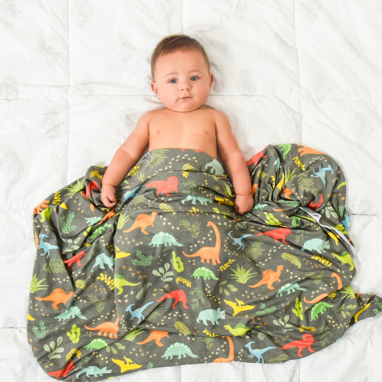 Extra Soft Stretchy Knit Swaddle Blanket: Jurassic Tracks