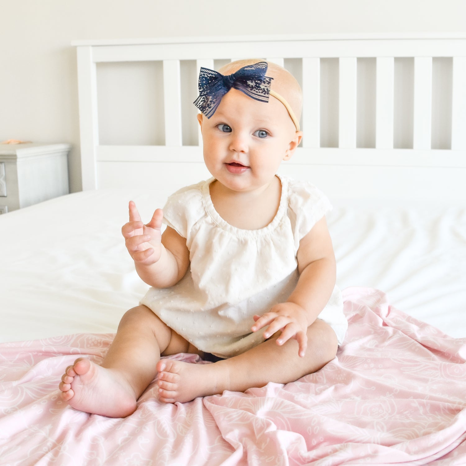 baby girl with stretch headband bow navy blue lace