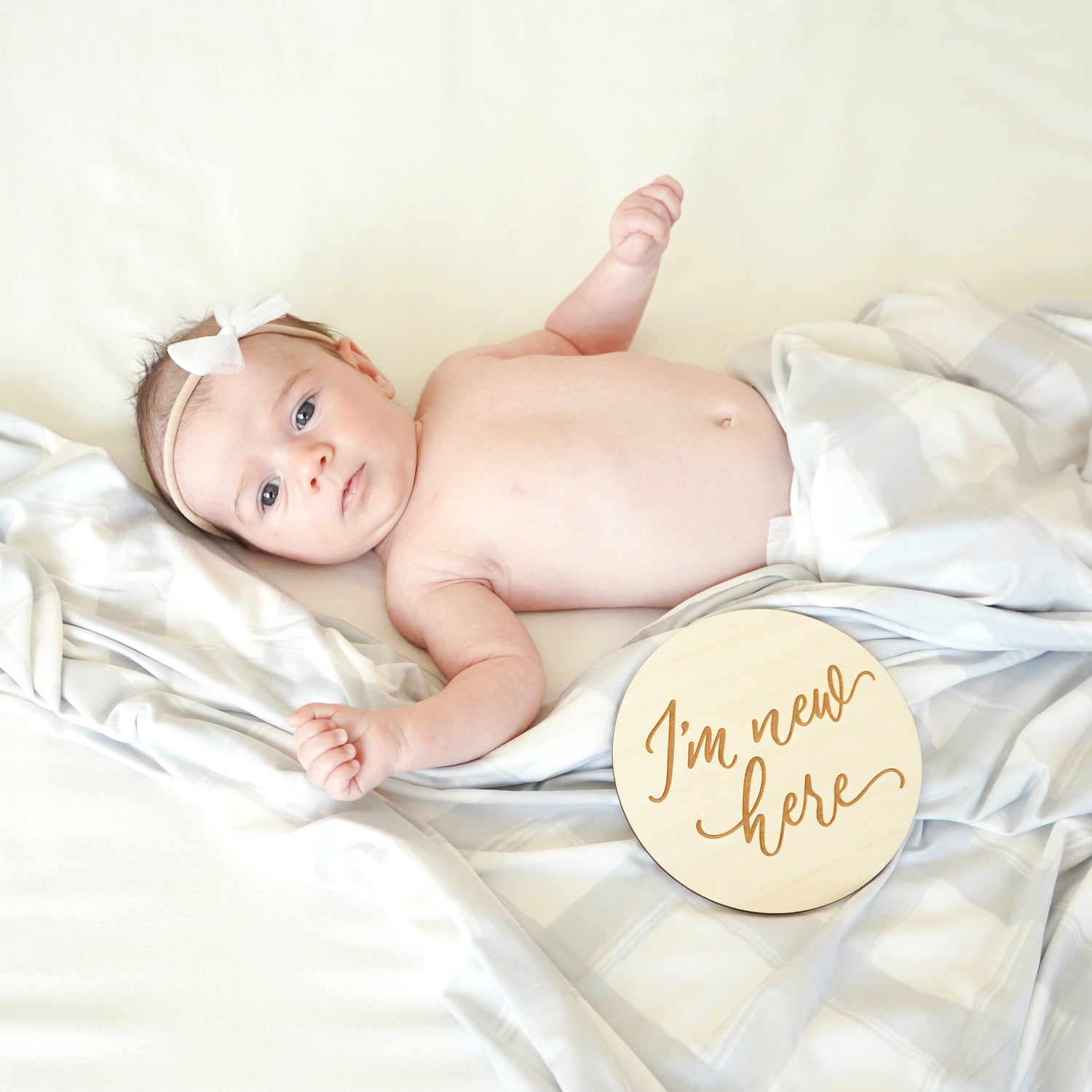 baby boy I'm new here sign newborn hospital photo