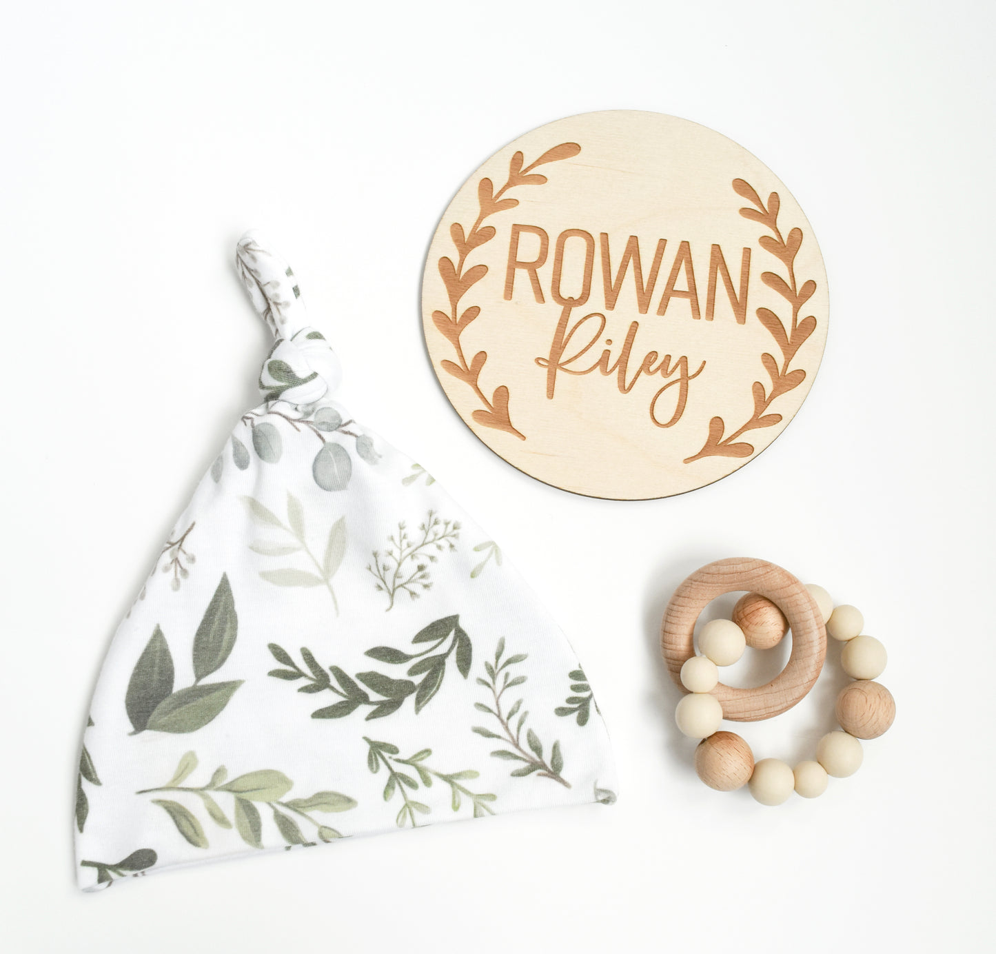 greenery name sign with hat and baby rattle gift set 
